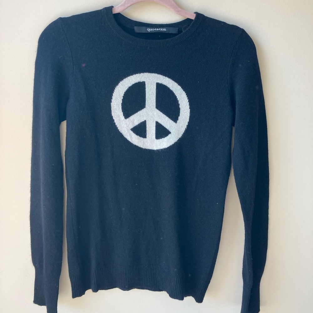 Black cashmere sweater with peace sign